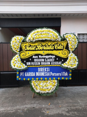 Papan Bunga Duka di Bandara